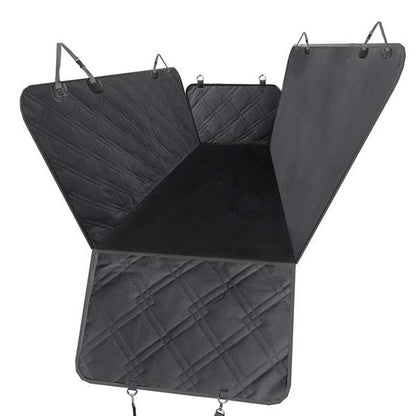 Teal Simba waterproof pet seat cover on car seat, protects fabric from pet hair, dirt, and spills during travel.
