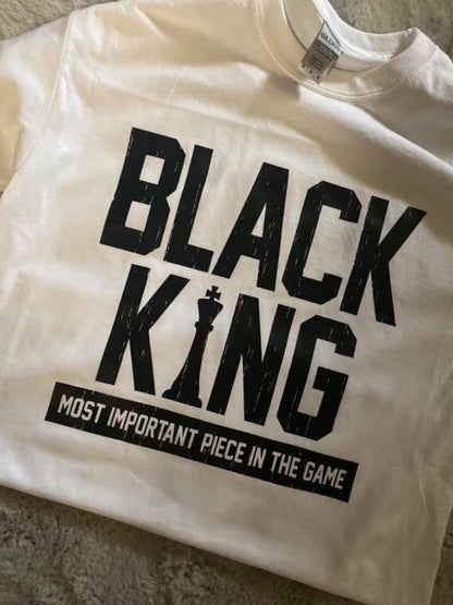 Black King T-shirt by Olive Dionysus featuring a classic fit with a bold king graphic on the front.