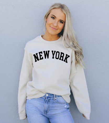 Gray Agate New York sweatshirt with a comfortable fit, featuring a classic crewneck and soft fabric for casual wear.