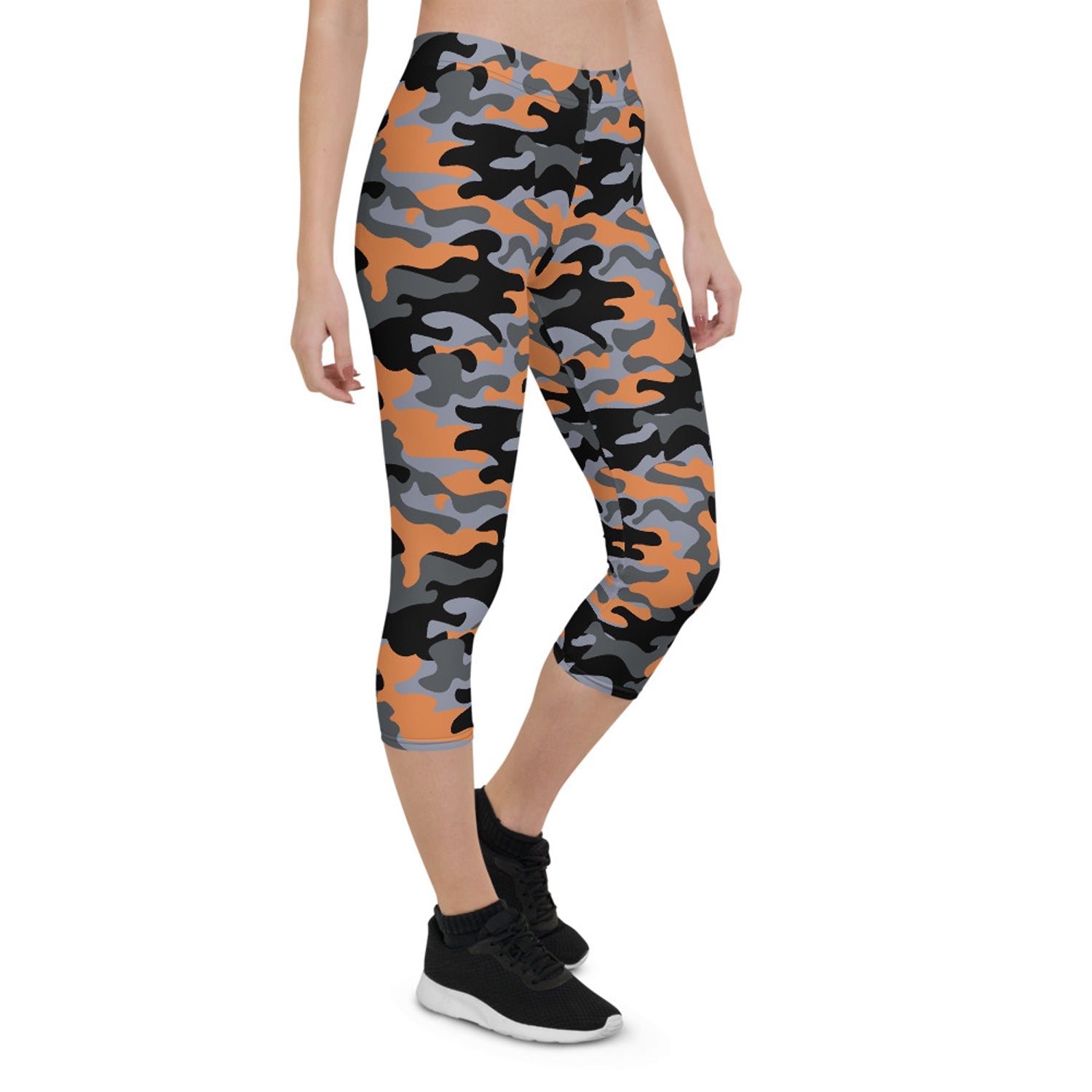 Orange and gray camo Capri leggings for women by Harlequin Icarus, showing the fitted waistband and camouflage pattern.