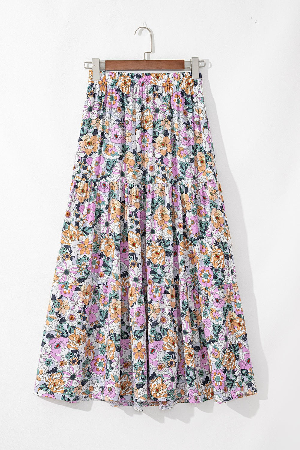 Byzantium Bay boho floral side slit tiered maxi skirt for women, featuring a flowing tiered design and floral print.