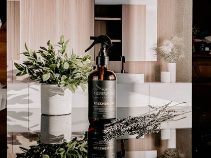 Periwinkle Poplar Freshen Up Linen and Room Spray in bathroom setting, showcasing the elegant spray bottle and fresh scent.