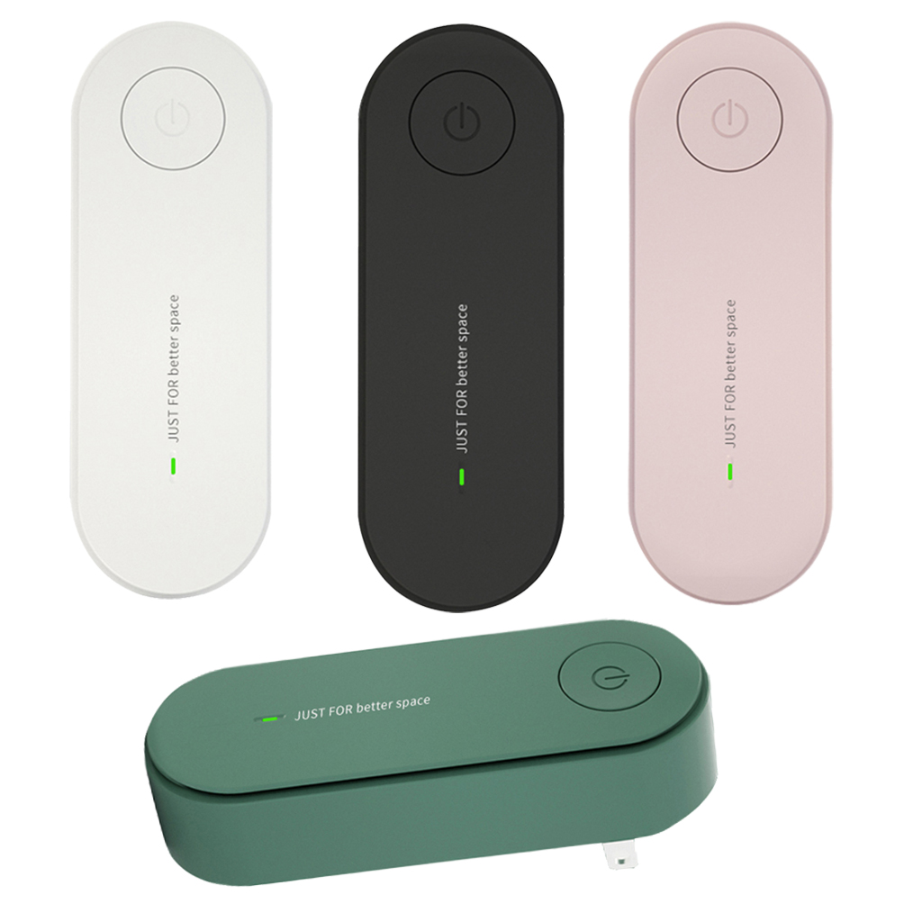 Teal Simba plug-in air purifier mini eliminator and freshener for home, showing compact device with vents and control buttons.