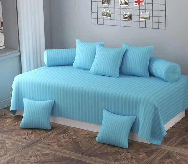 Sangria Alcestis 8-piece diwan set with a single flat bedsheet and five cushion covers in home and garden style.