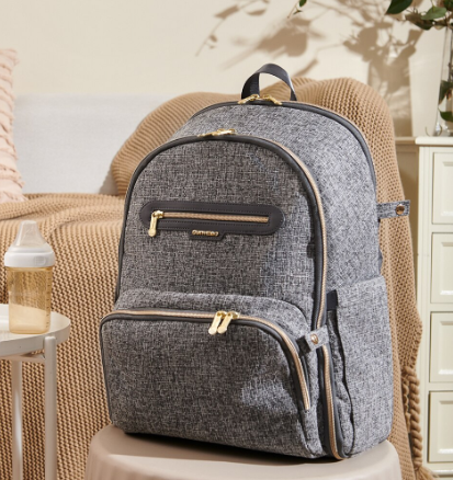 Maroon Chronos foldable backpack diaper bag with multiple compartments and adjustable straps, designed for parenthood and accessories.