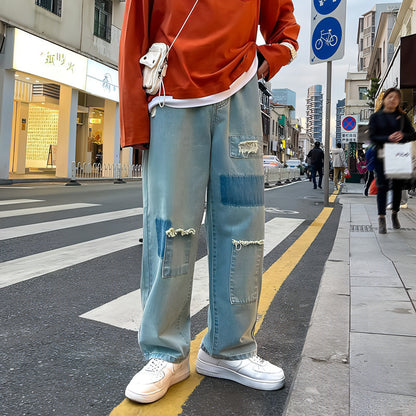 Carmine Juneberry DenimDare™ ripped jeans for men, loose straight-leg denim trousers with distressed details and classic fit.