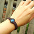 Braided Moonlight Labradorite bracelet by Fuchsia Molly featuring iridescent labradorite stones and woven leather cord.