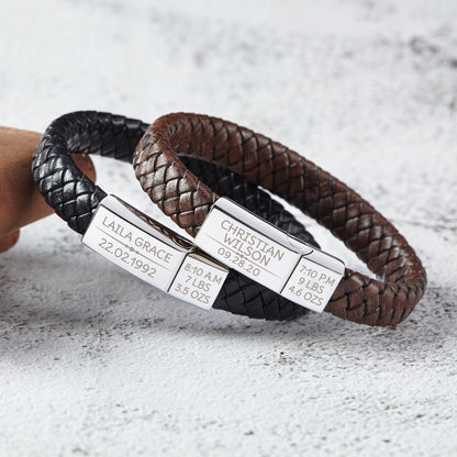 Green Millie baby footprint bracelet for new dads, featuring a silver bracelet with engraved baby footprint design.
