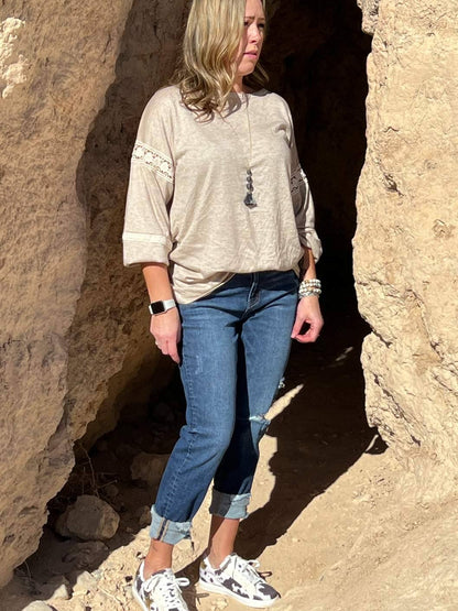 Oatmeal lace detail sleeve top by Ochre Ismene, featuring long sleeves and delicate lace accents, casual and stylish women&