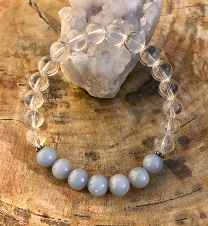 Angelite, celestite, and quartz gemstone bracelet by Violet Chaos featuring genuine crystals and elegant beaded design.