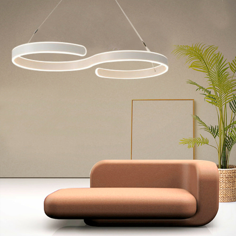 Contemporary acrylic LED swirl-shaped light fixture by Yellow Pandora, showcasing its modern design and bright illumination.