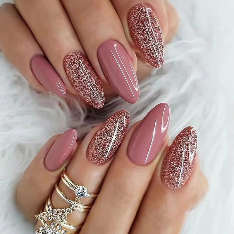 Reusable press on nails kit with glue and gel stickers from Plum Charlie, featuring neatly arranged false nail tips and application tools.