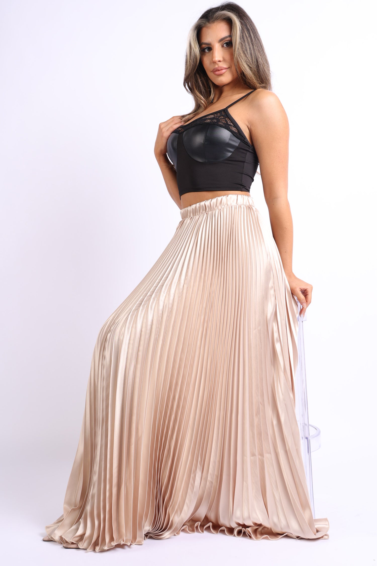 Elastic high waist taupe satin A-line pleated maxi skirt by Puce Juniper shown on a hanger.