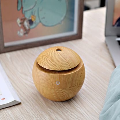 Fuchsia Molly wood grain desktop humidifier with sleek design for home and garden use, displaying the humidifier on a wooden surface.