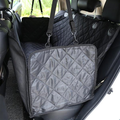 Teal Simba waterproof pet seat cover for cars, showing a durable, waterproof fabric with adjustable straps and side flaps for pets.
