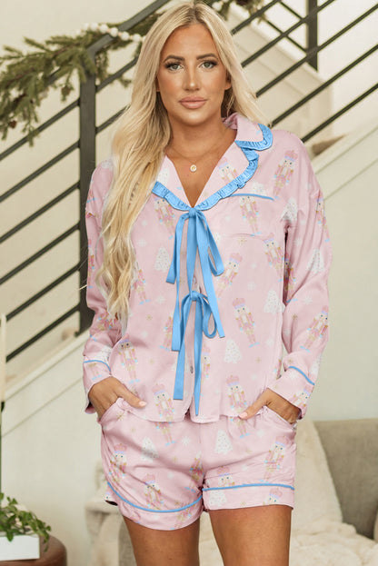 Byzantium Bay Christmas Bow Nutcracker pajama set for women, featuring a tie-front top and matching festive bottoms.