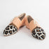 Pink Tulip Sapien calf hair leather flats, stylish slip-on shoes with a sleek design and textured animal print.