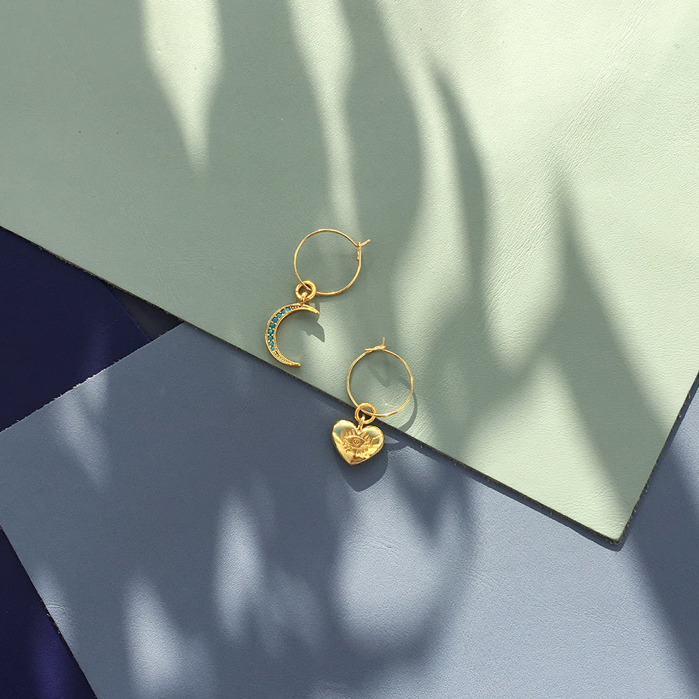 Yellow Athena crystal moon earrings featuring sparkling moon-shaped charms with delicate hooks for pierced ears.