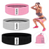 Set of three Lilac Milo resistance exercise bands for fitness and strength training, shown in various stretched positions.