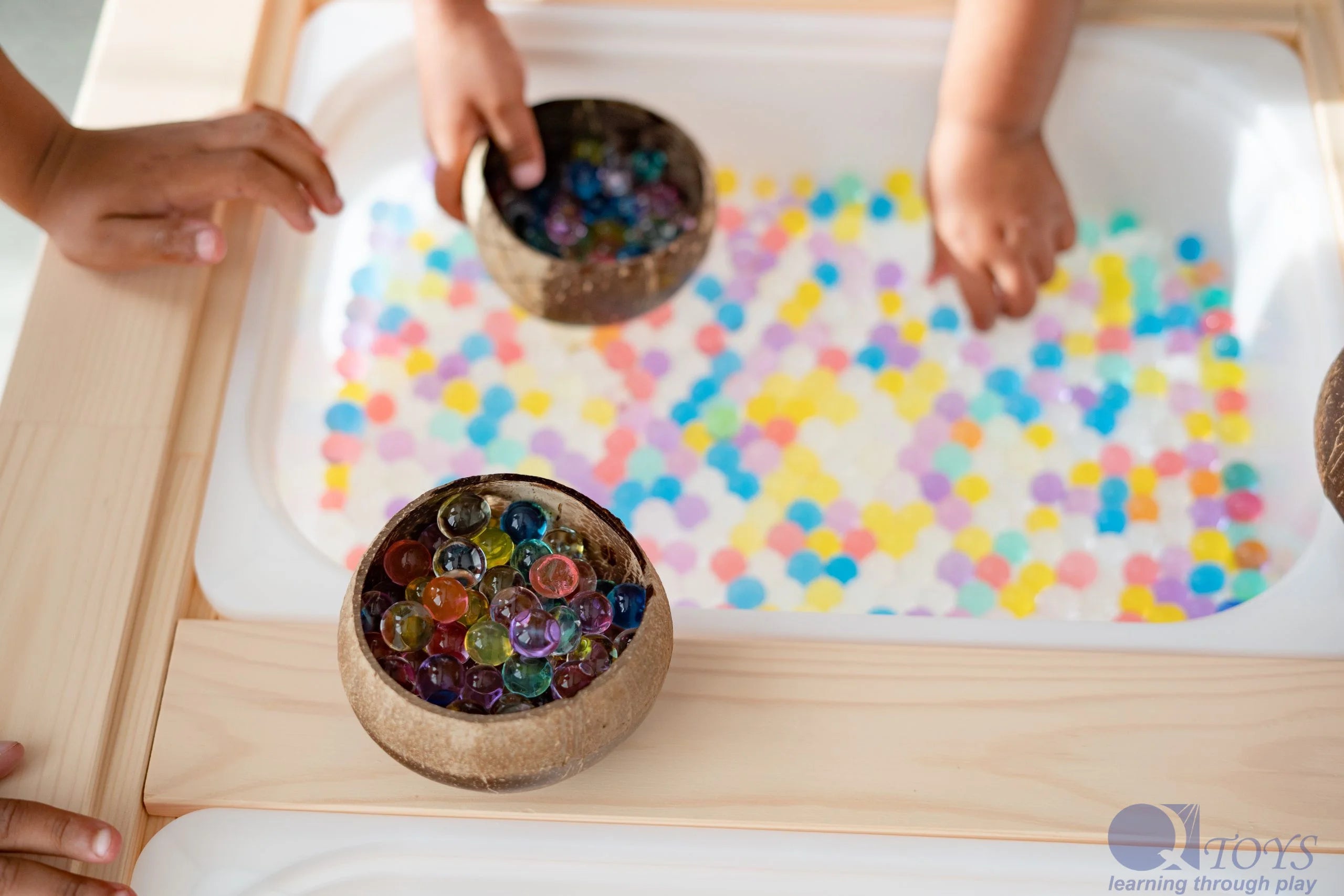 Set of six Plum Thanatos patterned coconut bowls from QToys Australia (USA), featuring colorful, decorative toy designs.