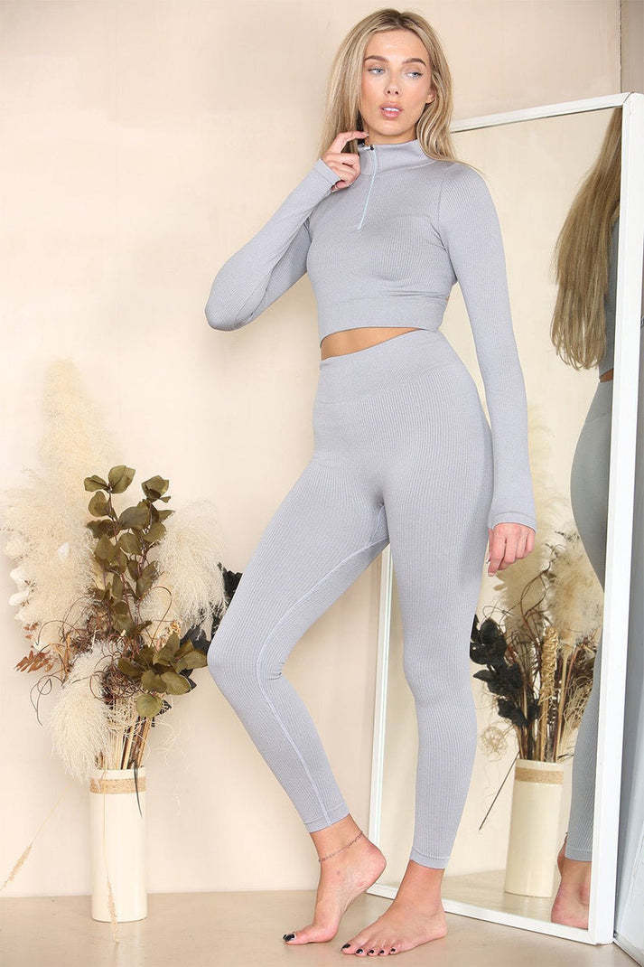 Carmine Juneberry ZipForm Gym Lounge Set Haute Edition 25 leggings in black with white stripe details, comfortable athletic wear.