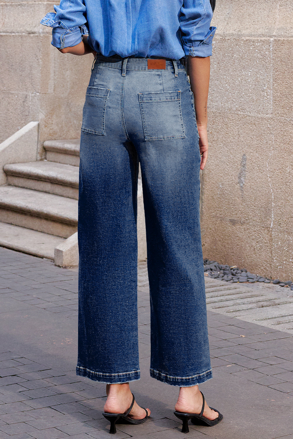 Byzantium Bay denim high waist straight leg jeans with patch pockets, classic blue wash, and a fitted high rise silhouette.