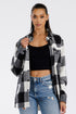 Lime Milo Boyfriend Oversized Soft Flannel Shacket in a cozy, plaid design, worn open as a stylish jacket.