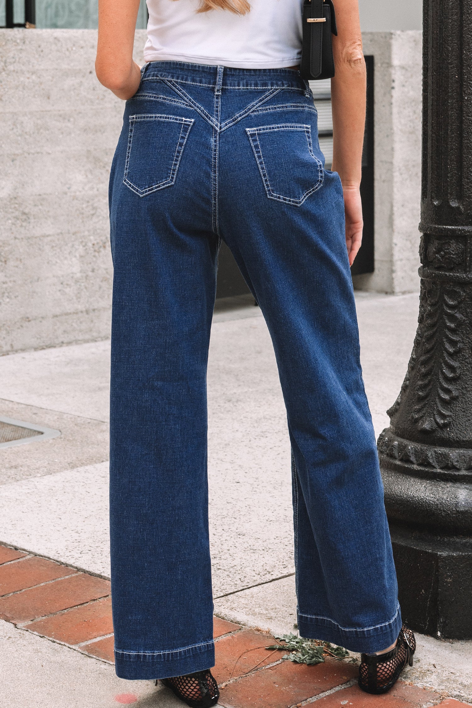 Byzantium Bay XX Denim Stitch high-waist cuff jeans featuring classic blue denim, high-rise fit, and rolled cuffs with stitched detailing.