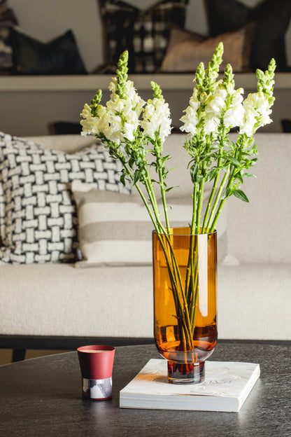 Harlequin Poplar Sober modern glass vase, cylindrical shape with solid base, in warm dark tones, ideal for home decor.