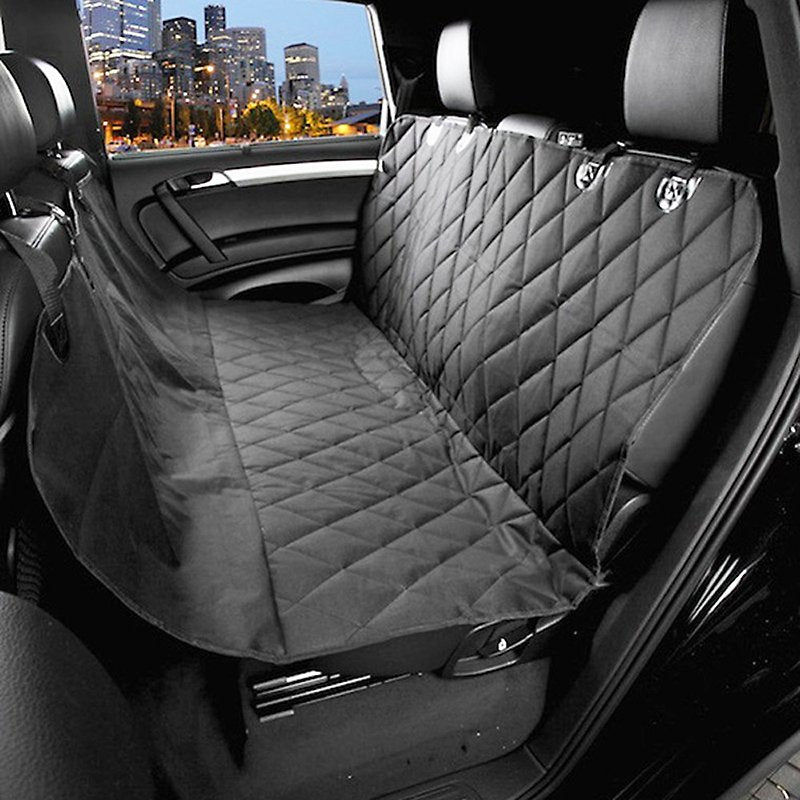 Fuchsia Molly automotive dog seat cover protecting car seats with durable, waterproof fabric and adjustable straps for pets.