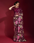 Women’s printed saree from Amethyst Alcestis, featuring colorful floral patterns and lightweight fabric, perfect for traditional occasions.