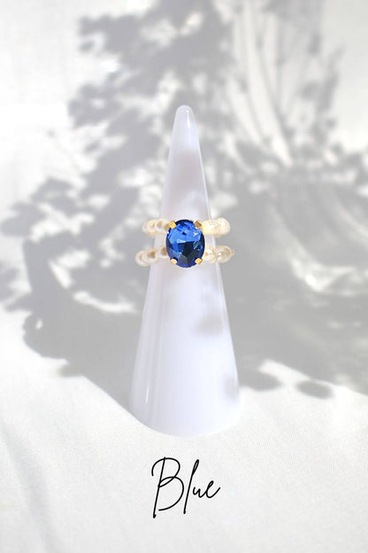 Ultramarine Birch 3 shades blue CZ and freshwater pearl rings with silver bands, showcasing elegant jewelry design.