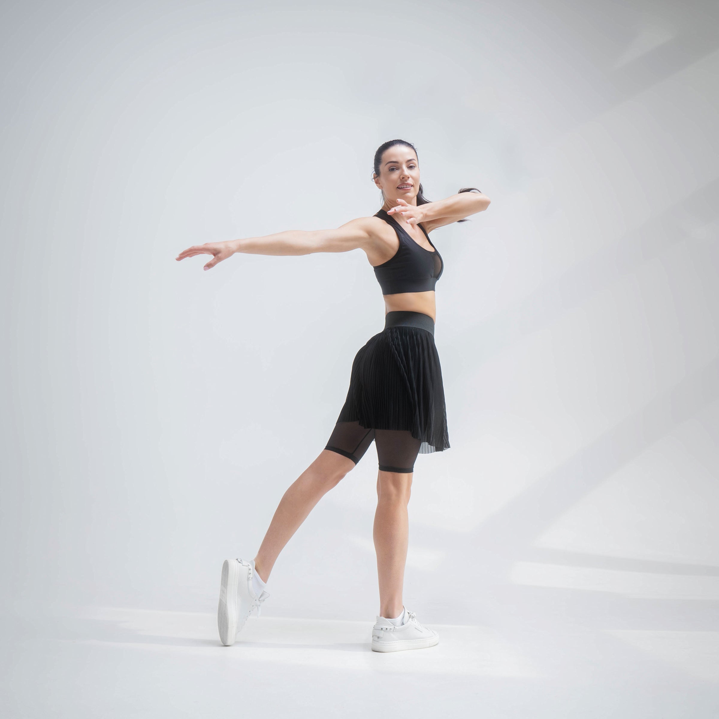 Indigo Thalassa MINI PLESSY MESH SKIRT with a lightweight, see-through mesh design in a short, stylish silhouette.