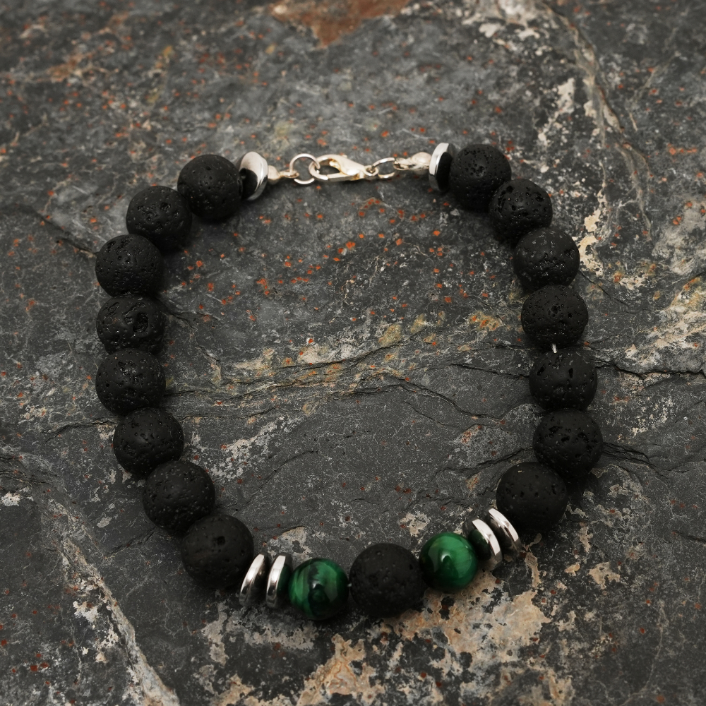 Handmade lava stone and green tiger eye bracelet for men by Tan Saffron, featuring black volcanic beads and polished green stones.