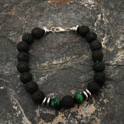 Handmade lava stone and green tiger eye bracelet for men by Tan Saffron, featuring black volcanic beads and polished green stones.