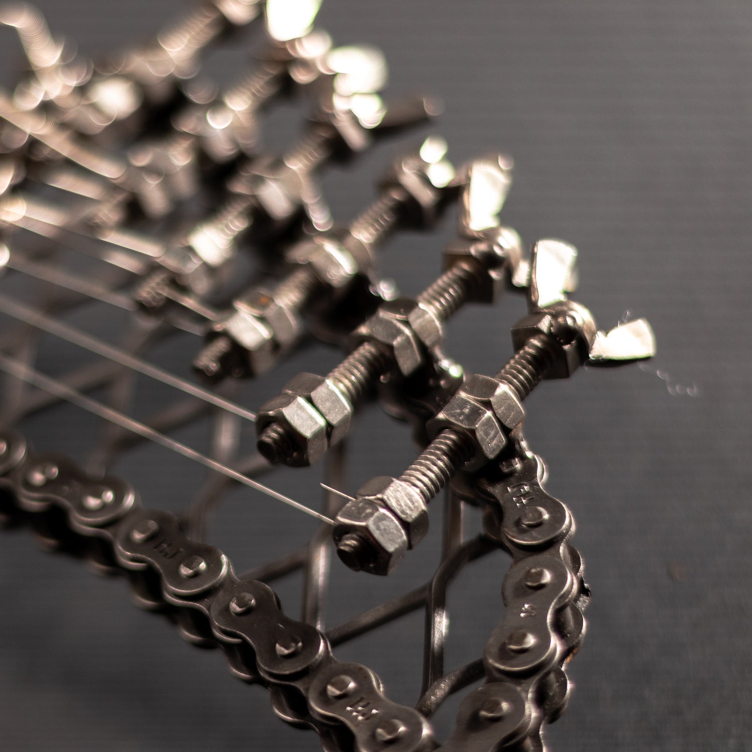 Metal electric guitar sculpture by Turquoise Poppy, heavy metal wall art decor, showcasing a detailed, artistic guitar design for home decoration.