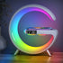 Teal Simba multifunctional wireless charger, alarm clock, and speaker with app control for tech accessories.