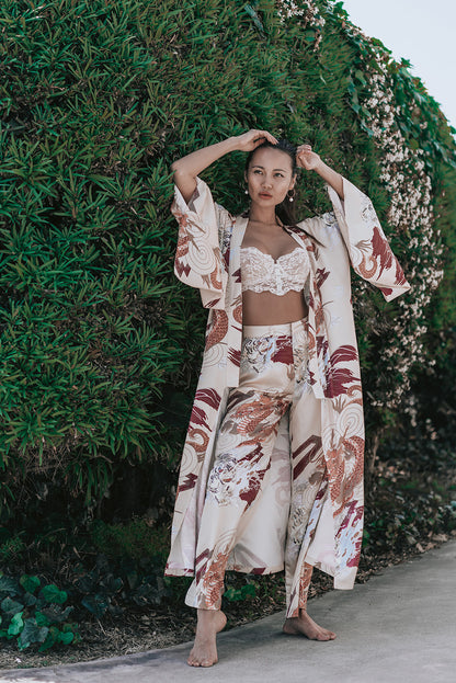 Azure Thanatos Kayda Satin Wide Leg Pants in matching set, showcasing smooth satin fabric and wide-leg silhouette.