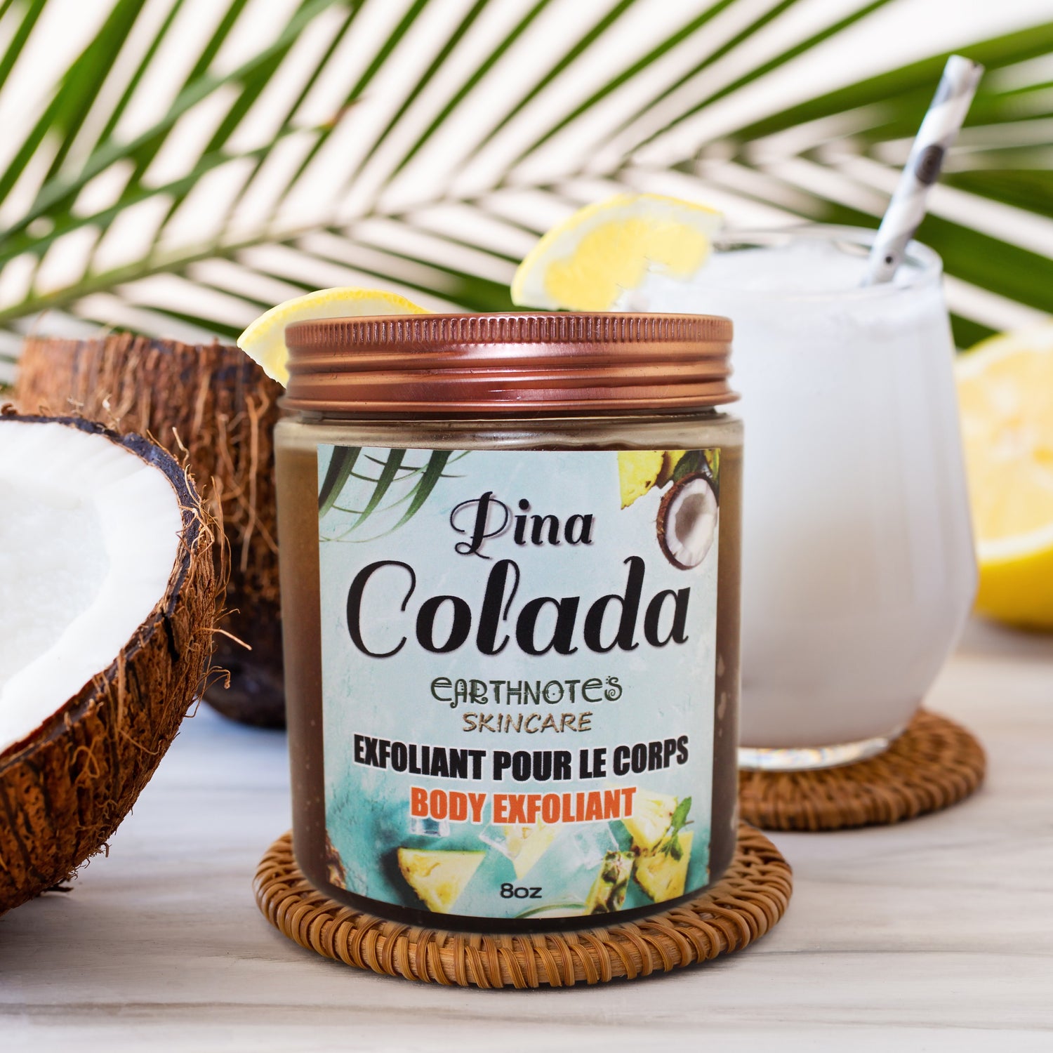 Silver Birch Cheers to Summer Pina Colada Body Exfoliant with tropical scent, featuring a jar of exfoliating body scrub and natural ingredients.