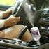 Fuchsia Molly Car Humidifier by Nanum, compact automotive humidifier sitting on a car dashboard with a sleek design.