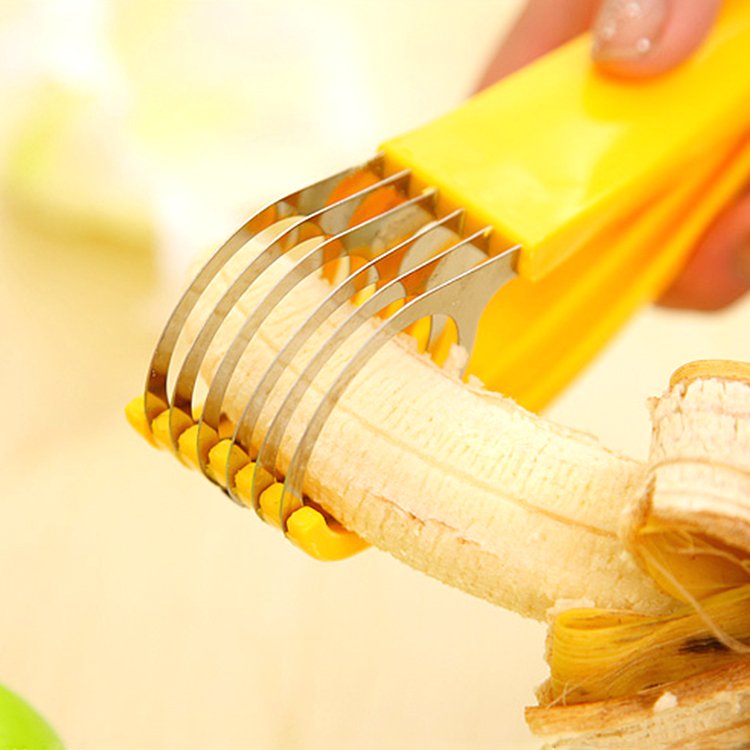 Fuchsia Molly Banana Ham Slicer in a home kitchen, showing the ergonomic handle and sharp blades for precise slicing.
