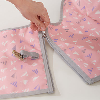 Maroon Chronos folding travel changing pad for kids and babies, compact and portable with soft surface for on-the-go diaper changes.