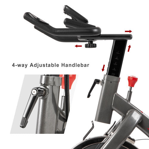 Teal Simba indoor cycling bike with 4-way adjustable handlebar and seat, LCD monitor for tracking workout metrics.