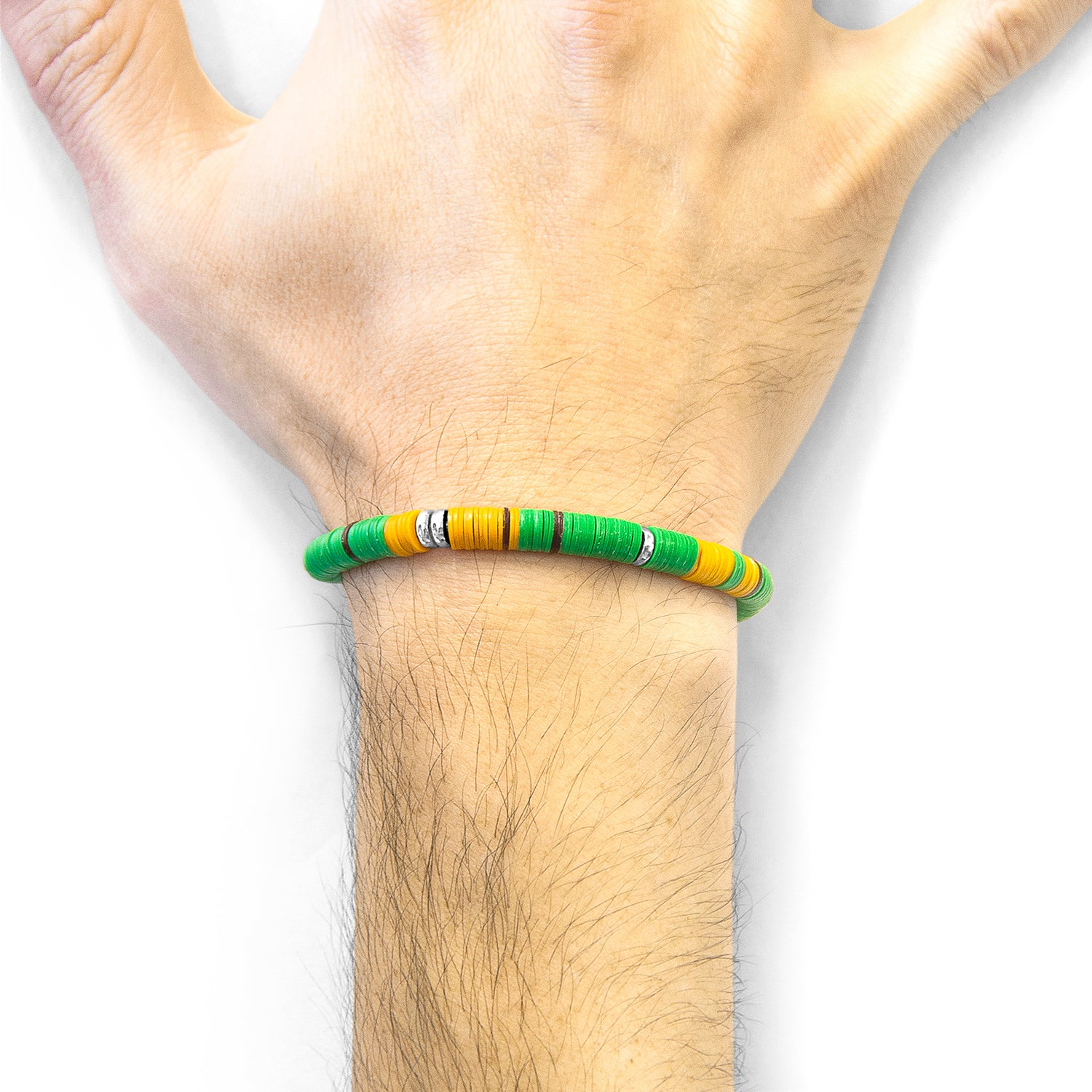 Green Malawi silver and vinyl disc bracelet by Magenta Sooty featuring silver accents and vibrant green vinyl discs.