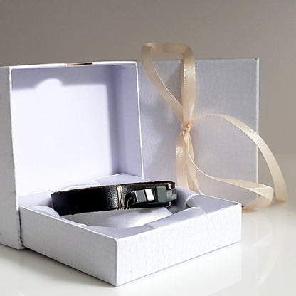 Large black leather and hematite band bracelet by Maroon Smudge, featuring a sleek, modern design with bold metal accents.