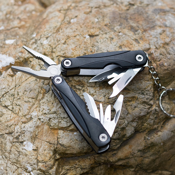 Fuchsia Molly outdoor multifunction camping tools with various tools and handles, ideal for camping and outdoor adventures.