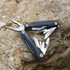Fuchsia Molly outdoor multifunction camping tools with various tools and handles, ideal for camping and outdoor adventures.