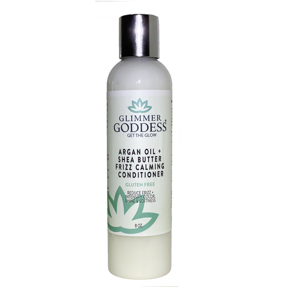White Thalassa Argan Oil and Shea Butter Frizz Calming Hair &amp; Scalp Conditioner bottle with pump for nourishing hair care.