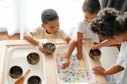 Set of six Plum Thanatos patterned coconut toy bowls from QToys Australia (USA), featuring colorful, tropical-inspired designs.