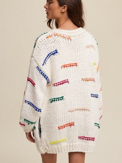 Hand crochet boho open front chunky cardigan sweater by Champagne Erebus, featuring a cozy, textured design and relaxed fit.